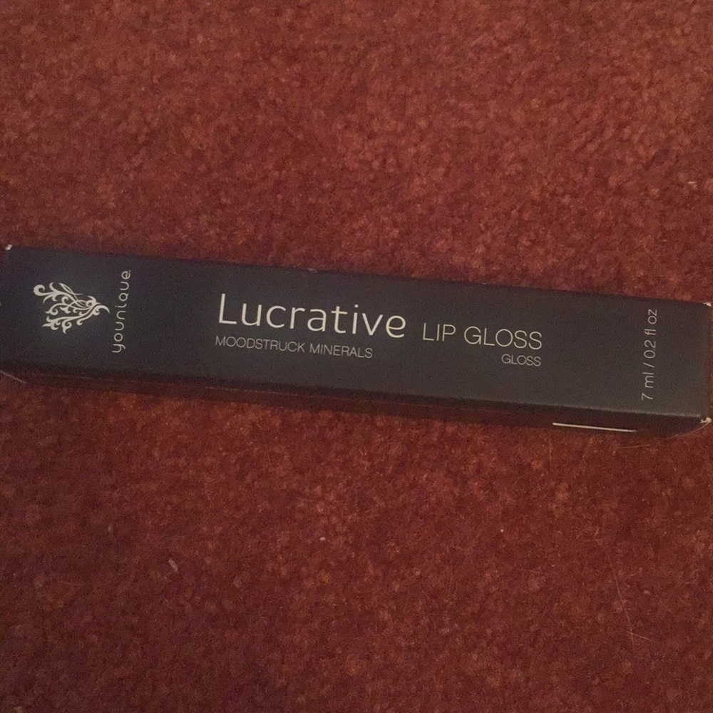 Younique Lucrative lipgloss in the color livid